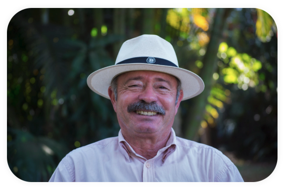 Portrait of a smiling Brazilian coffee producer.