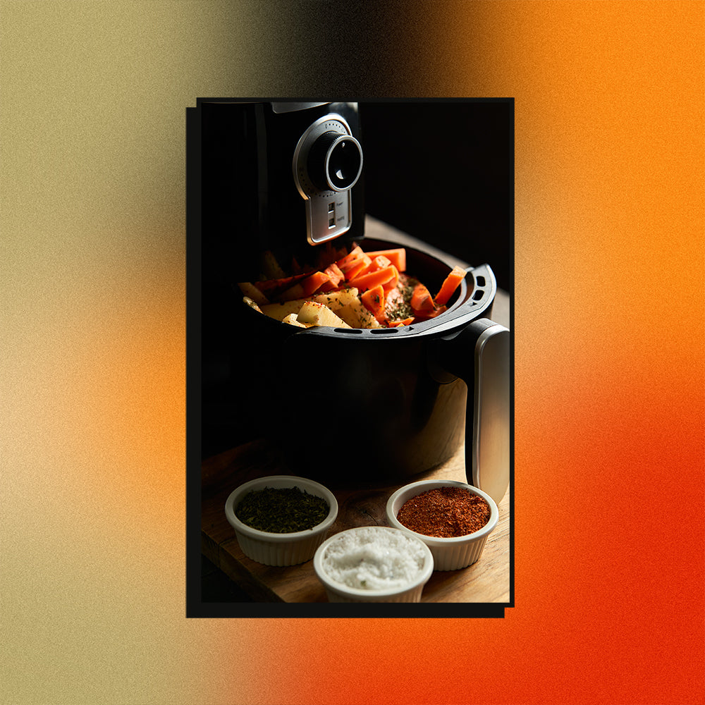 An image of an air fryer on a mesh gradient background.