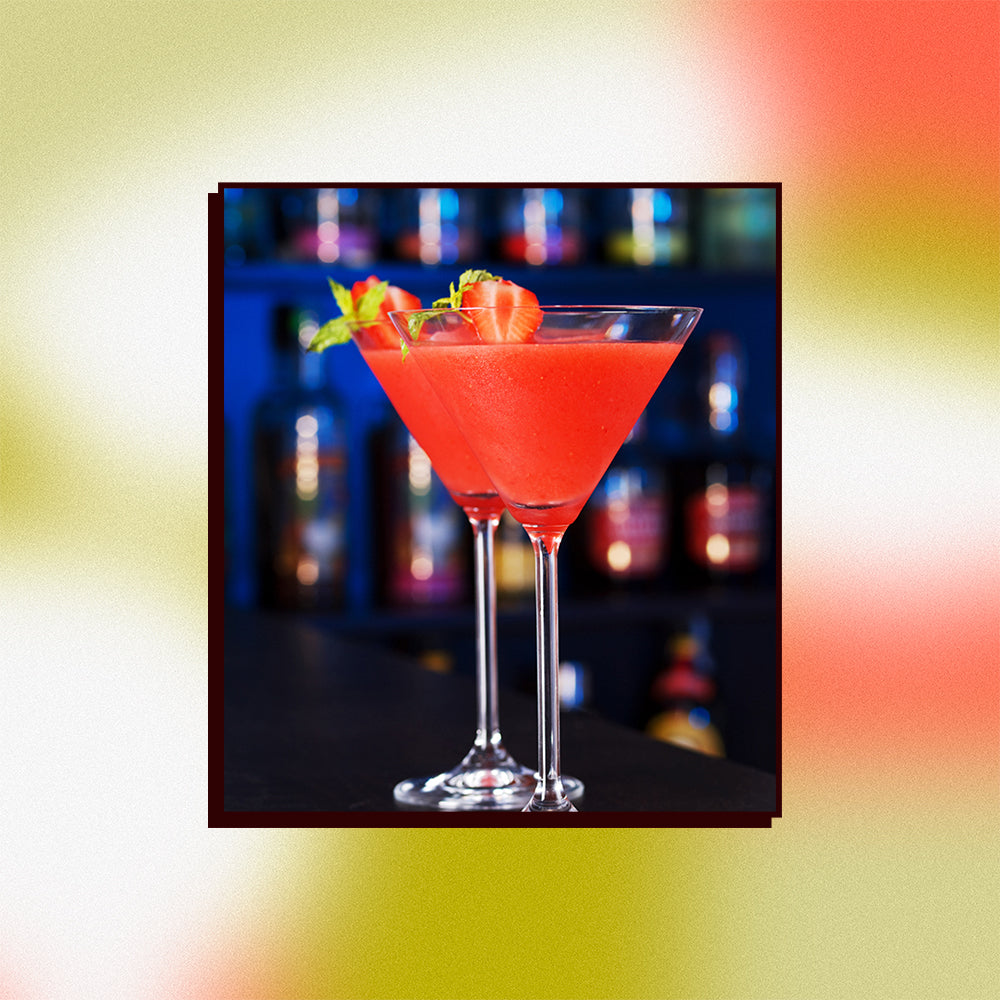 An image of a strawberry iced tea cooler in a bar setting on a mesh gradient background.