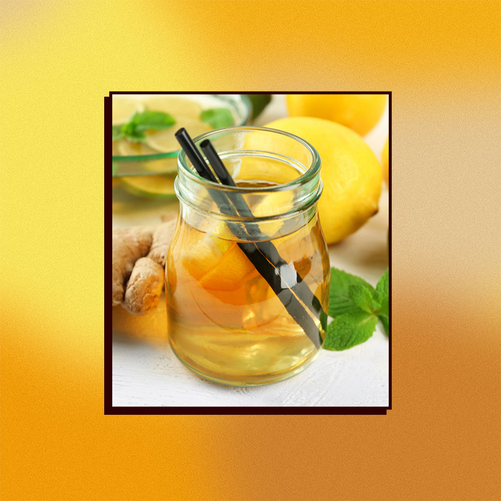 An image of ginger marmalade pu-erh iced tea on a mesh gradient background.