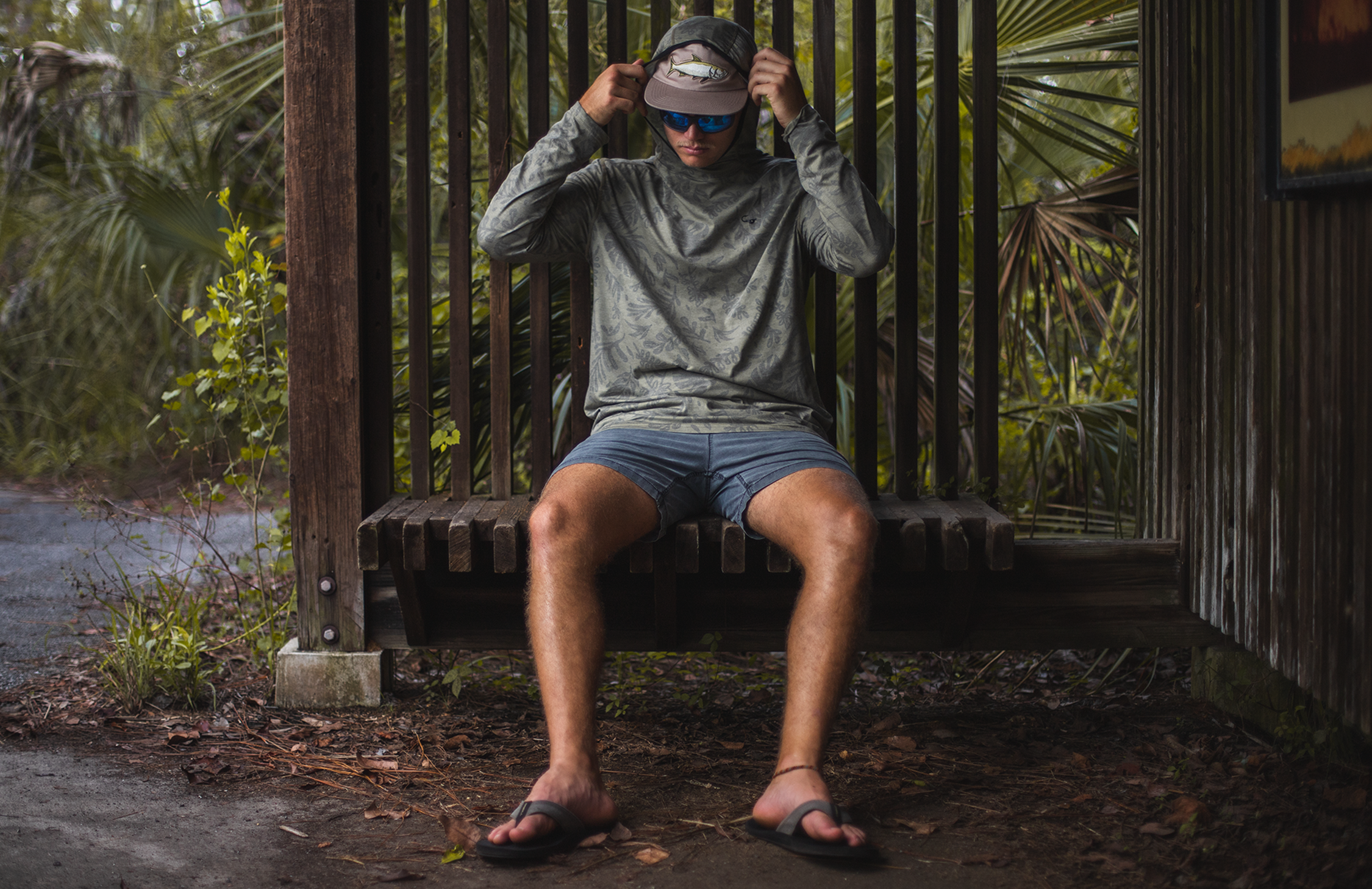 Man wearing the Jigalode Mighty Jig UPF Performance Fishing Shirt while hiking a trail in Everglades National Park.