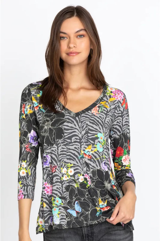 Zippy Multi 3/4 Slv Swing Tee by Johnny Was. Shop at The Painted Cottage, an award winning Annapolis Boutique. Black/multi floral and animal print V neck tee with three-quarter sleeves.