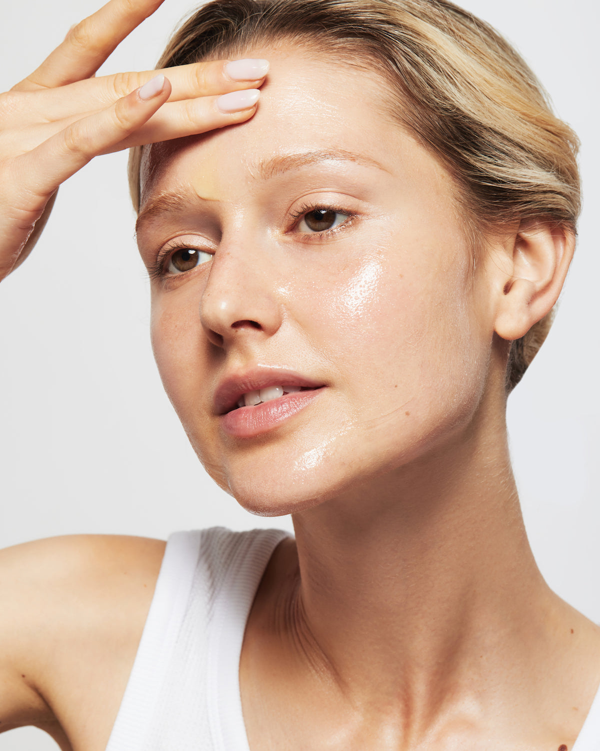 Woman using new Diamond Contour 20% Vitamin C Skin Resurfacing Oxygen Peel