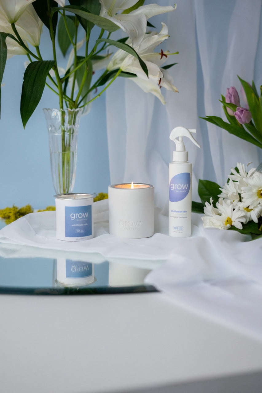 Capture the essence of nature with Wildflower Rain - a 100% plant-based candle and spray with notes of water lily, lilac, and honeysuckle. Bring the outdoors inside with this refreshing and airy aroma.