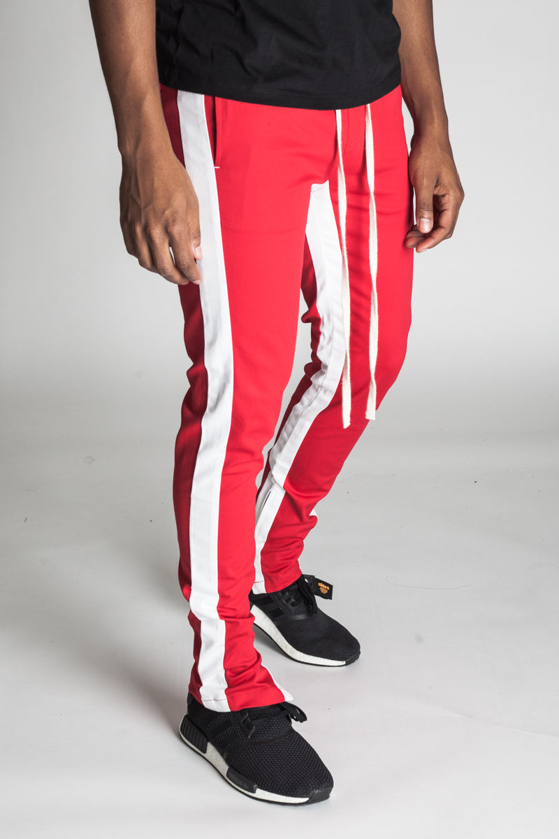 STRIPED TRACK PANTS WITH ANKLED ZIPPERS