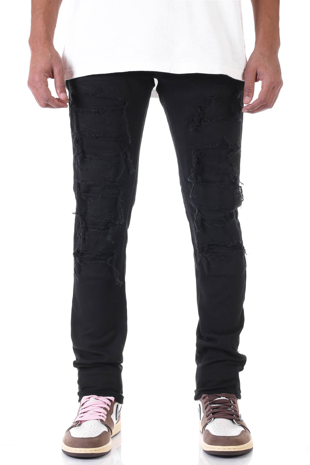 PATCHED AND DISTRESSED SKINNY PANTS