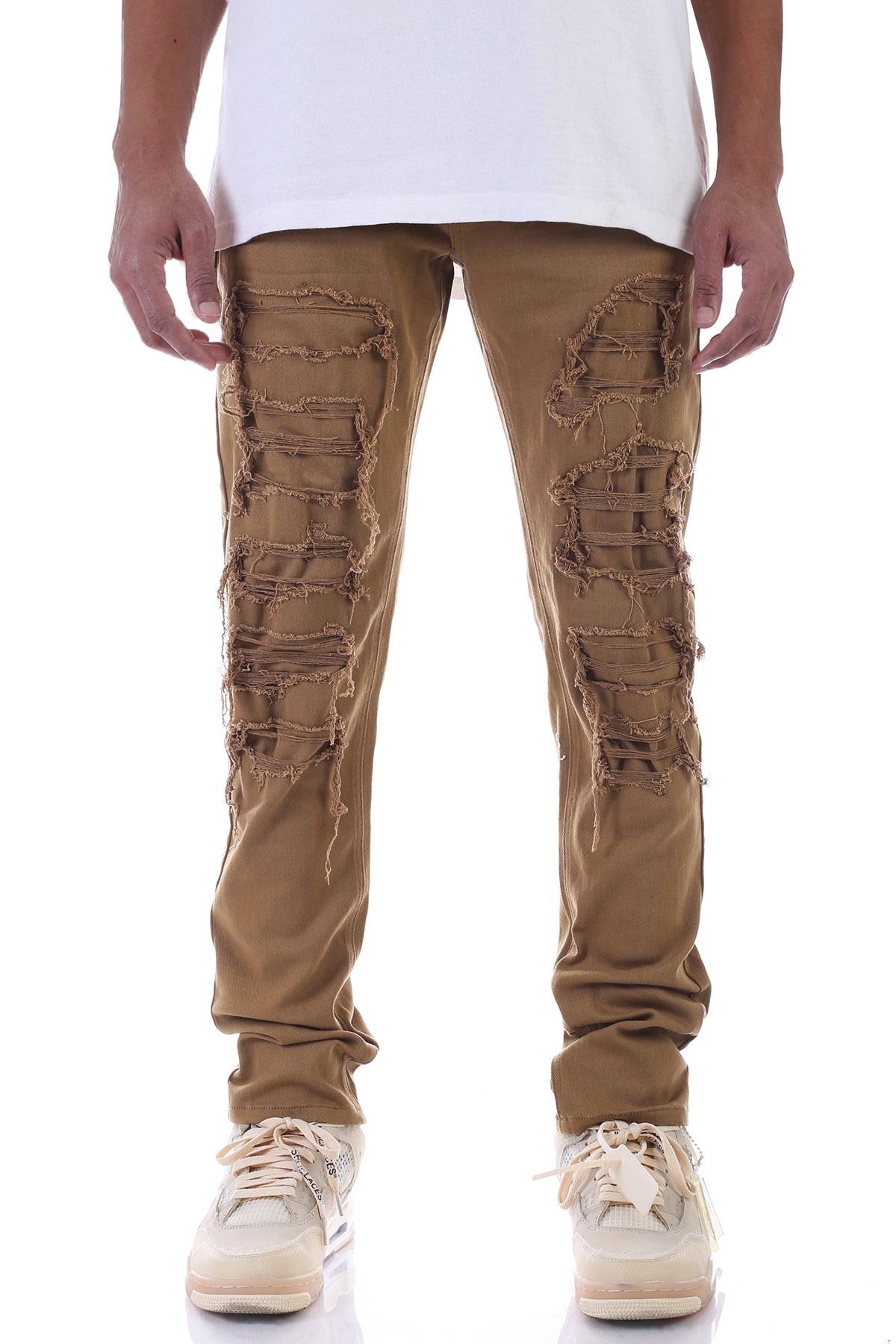 PATCHED AND DISTRESSED SKINNY PANTS