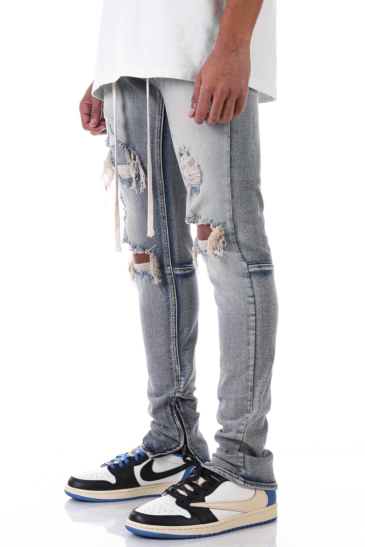 UNDER-PATCH ANKLE ZIP JEANS