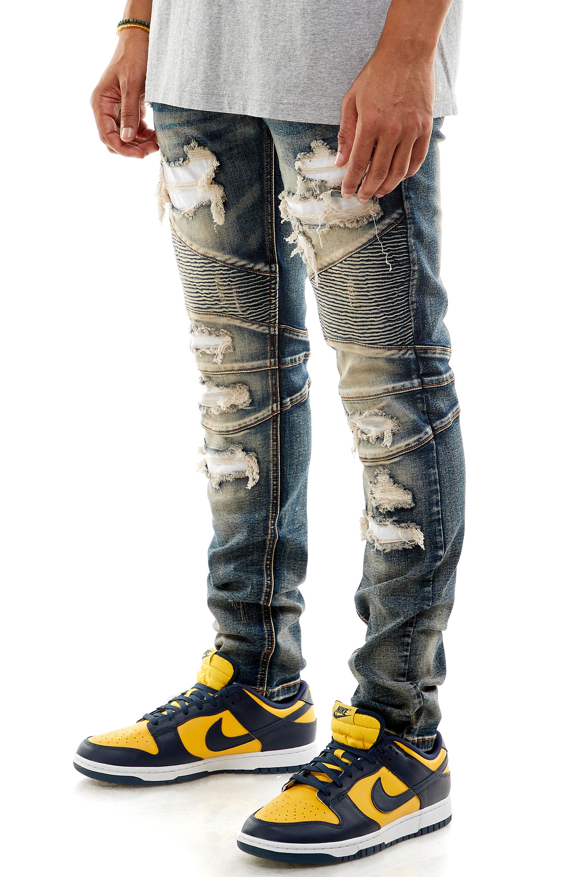 PATCHED MOTO JEANS