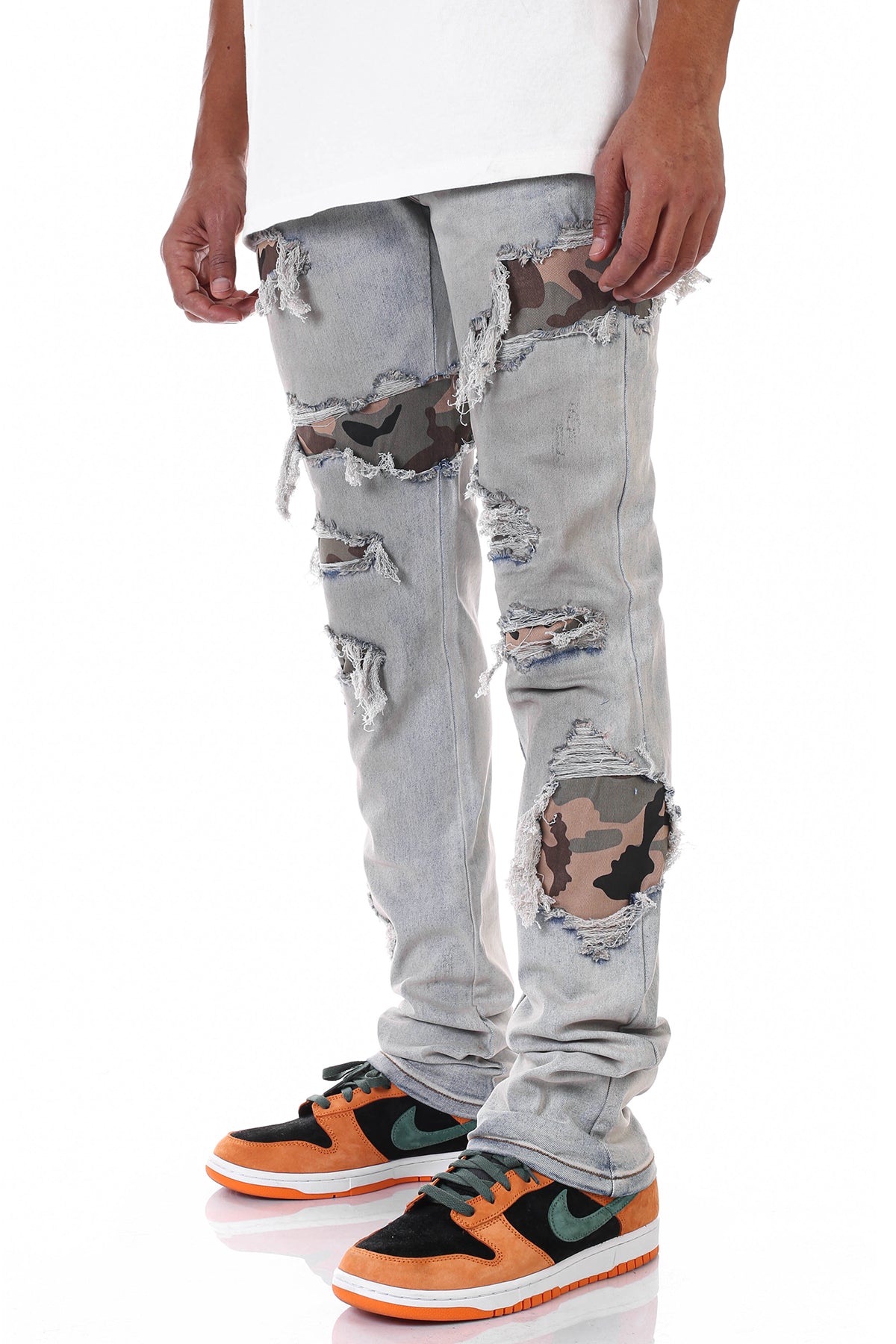 STACKED CAMO PATCH JEANS