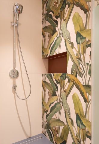 Shower with palm leaf designed tiles