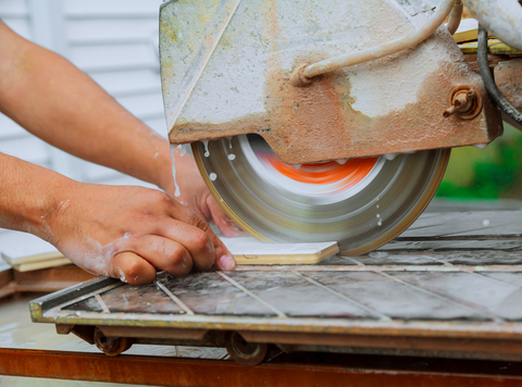 Cutting tile with a wet saw