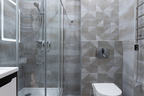 Bathroom and shower with gray tile