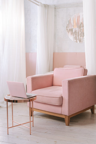 Living room with pink chair