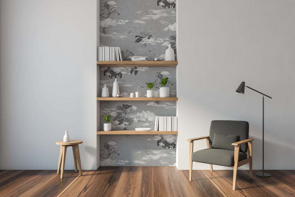 Bookshelves lined with wallpaper