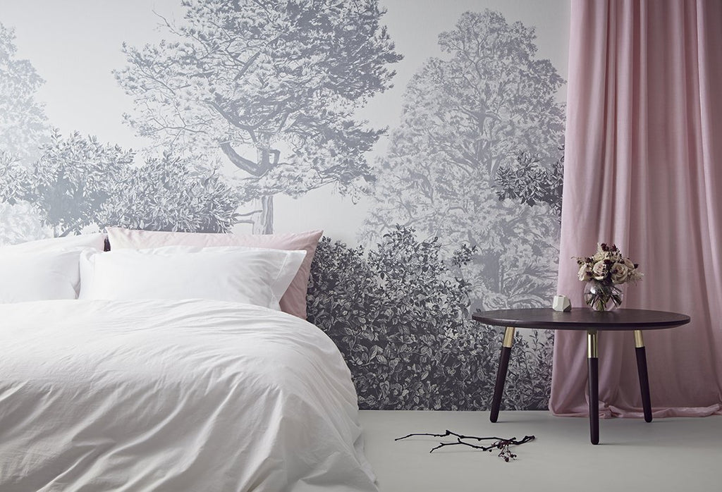 Sian Zeng's Hua Trees Wallpaper in Grey paired with the Range Round Coffee Table from MADE