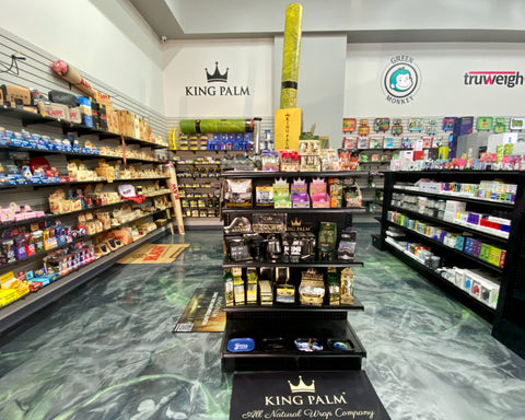 A wide angle shot of the rolling paper and King Palm section in the Cannatron wholesale showroom.