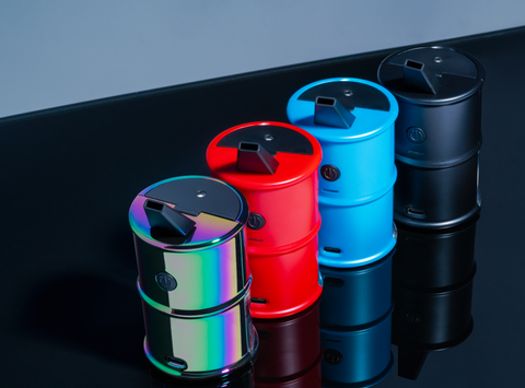 The 4 colors of the Ooze Electro Barrel are lined up on an angle. From front to back they are rainbow, ruby red, arctic blue and panther black.