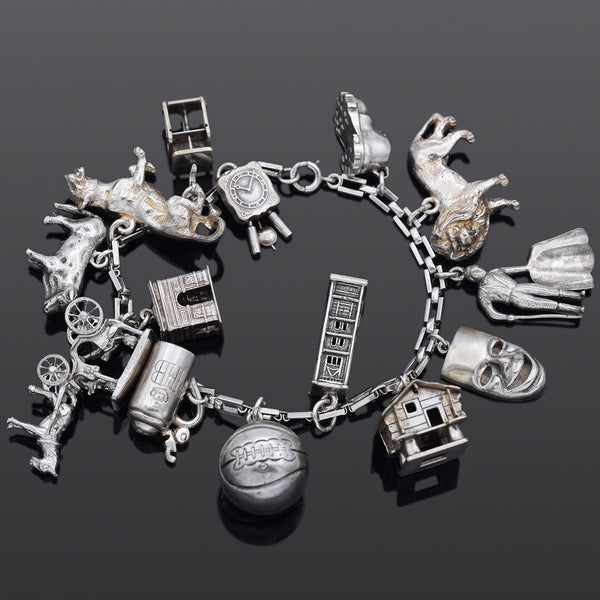 Etruscan Revival 800 Sterling Charm Bracelet with Ten Different Charms