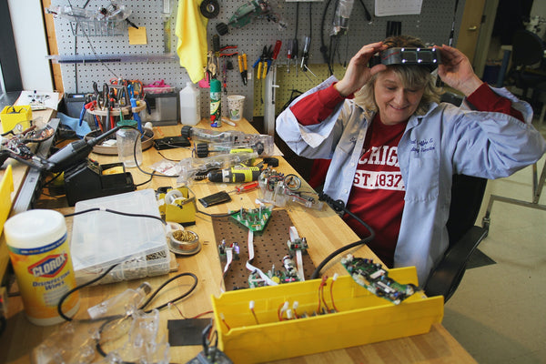 A woman technician doing benchtop works