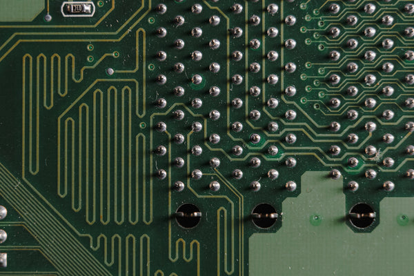 A green color circuit board with solder masks