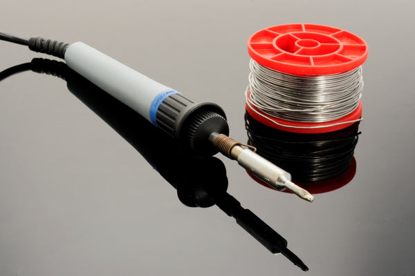 Image of soldering iron and a soldering wire