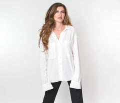 woman wearing white shirt with breast pockets