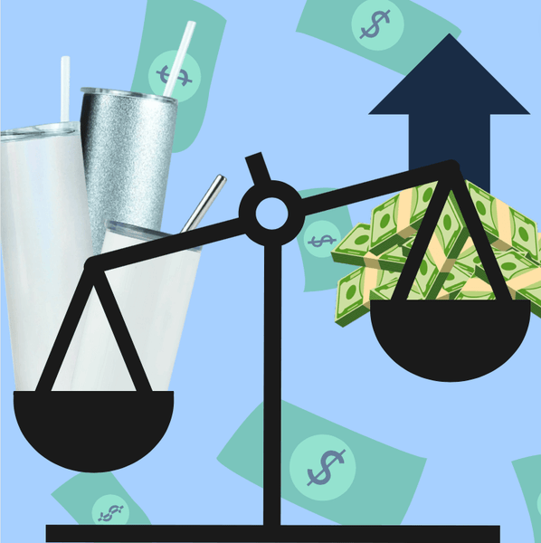 a scale with a tumblers and a stack of money