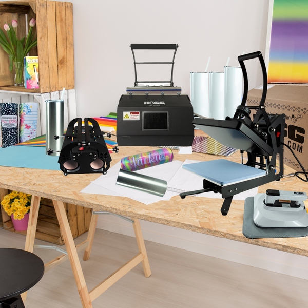 A table with different kinds of heat press and tumblers.