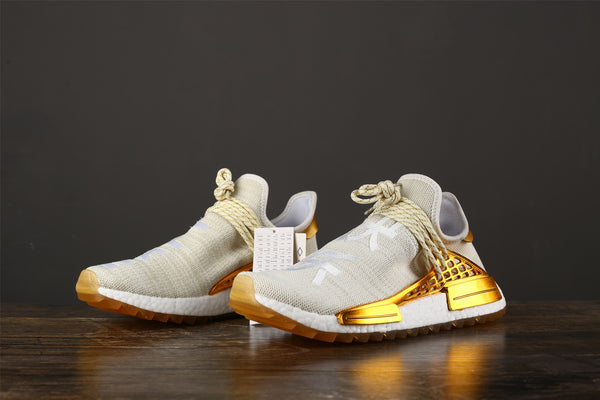 gold and white human race