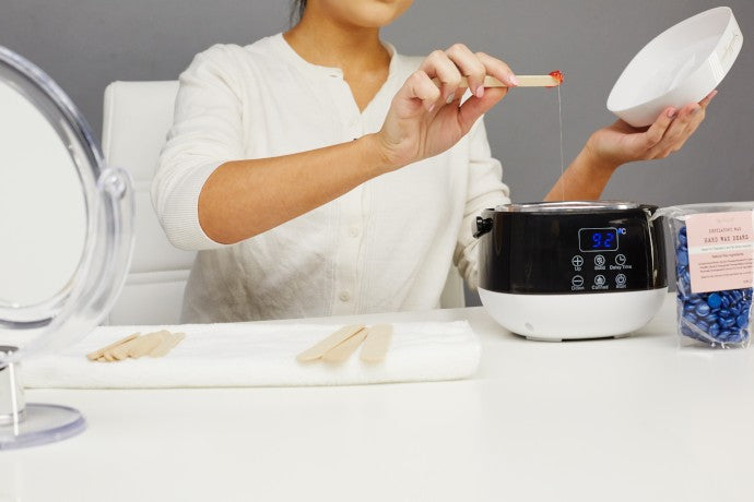 Women using the Sparkly Home Wax Kit