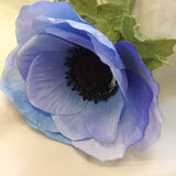 a blue anemone silk flower