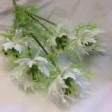 a white nigella silk flower