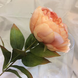 a peach peony silk flower