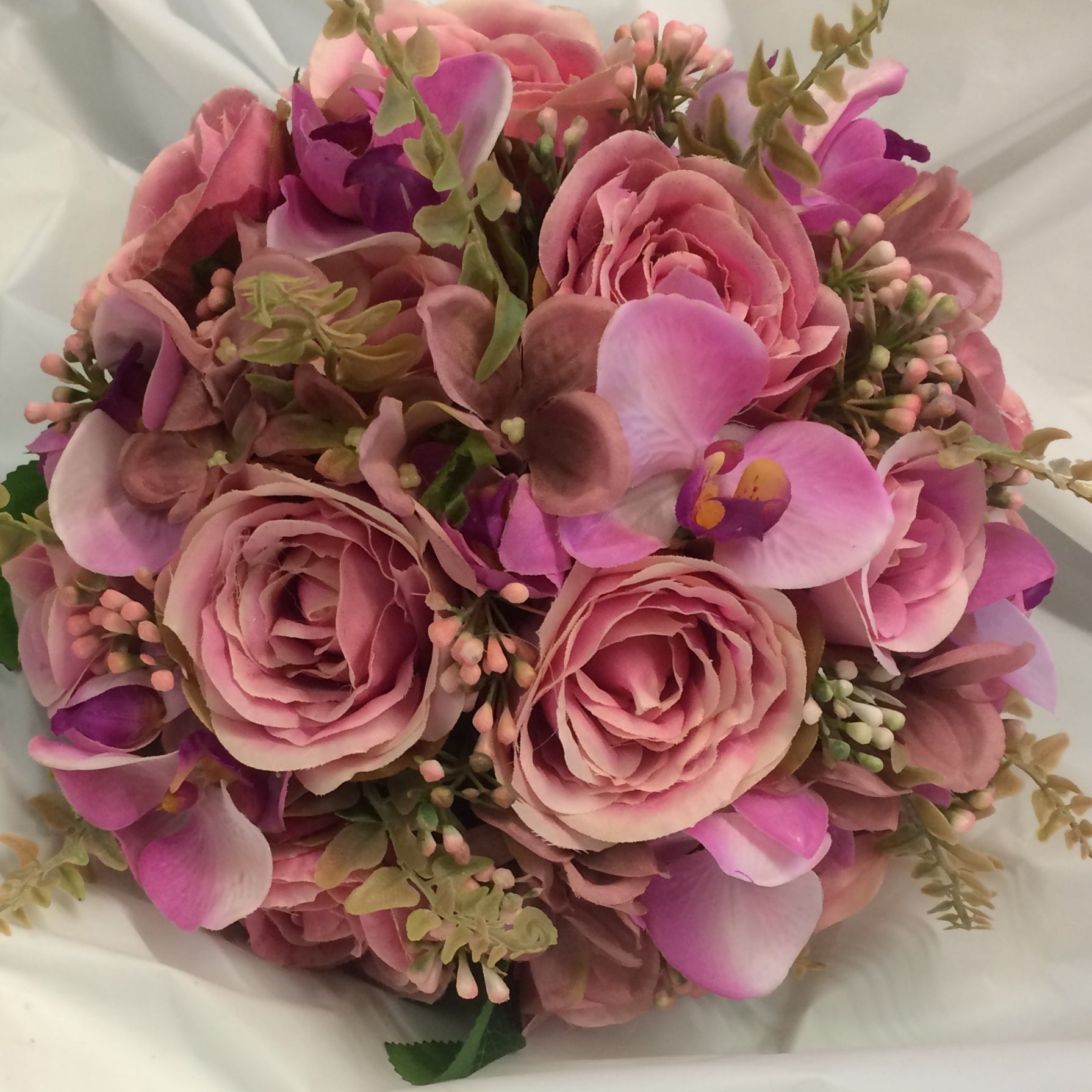 A wedding bouquet colllection of dusky pink roses, hydrangea and orchi –  AbigailRose