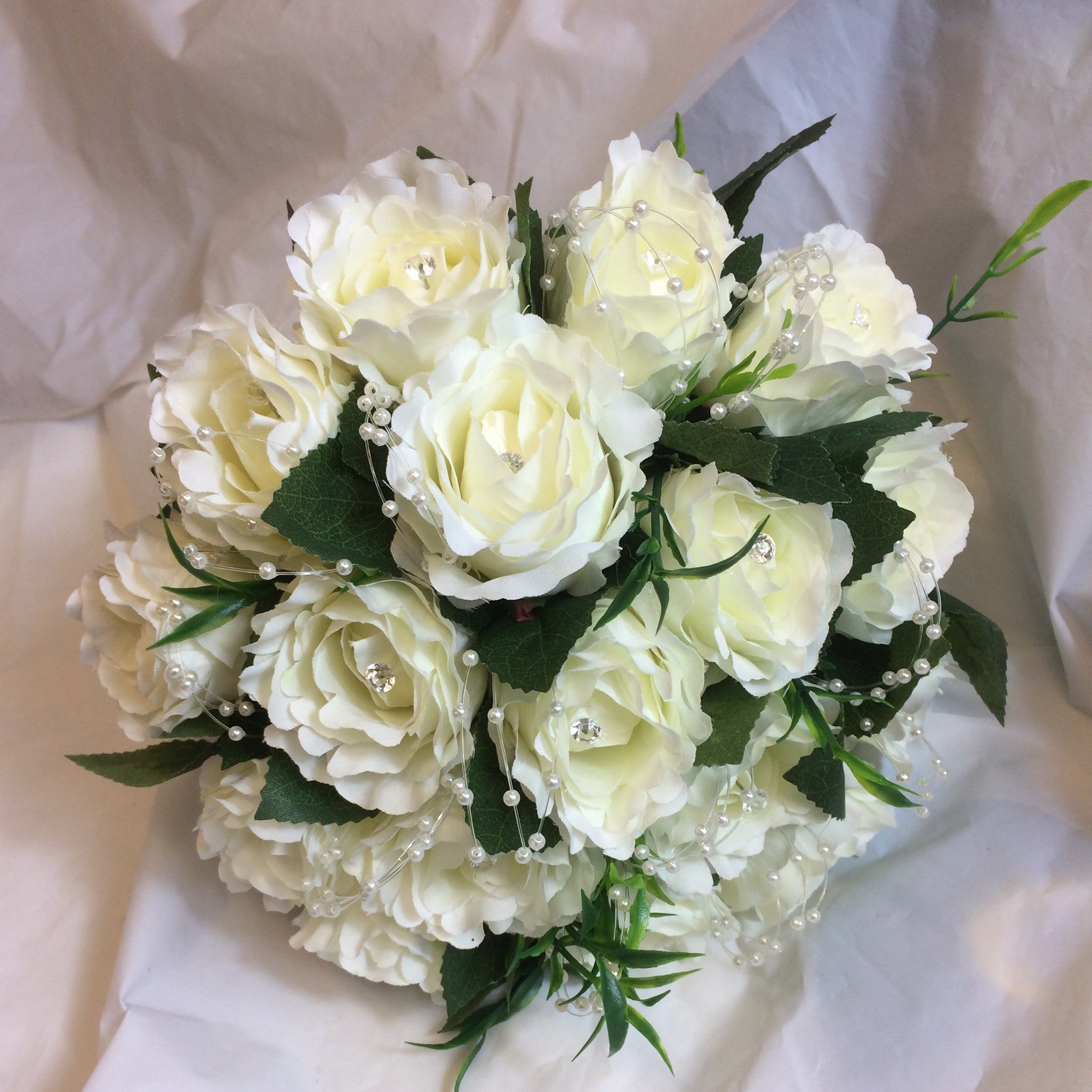 A wedding bouquet collection of silk ivory roses with diamante & pearl ...
