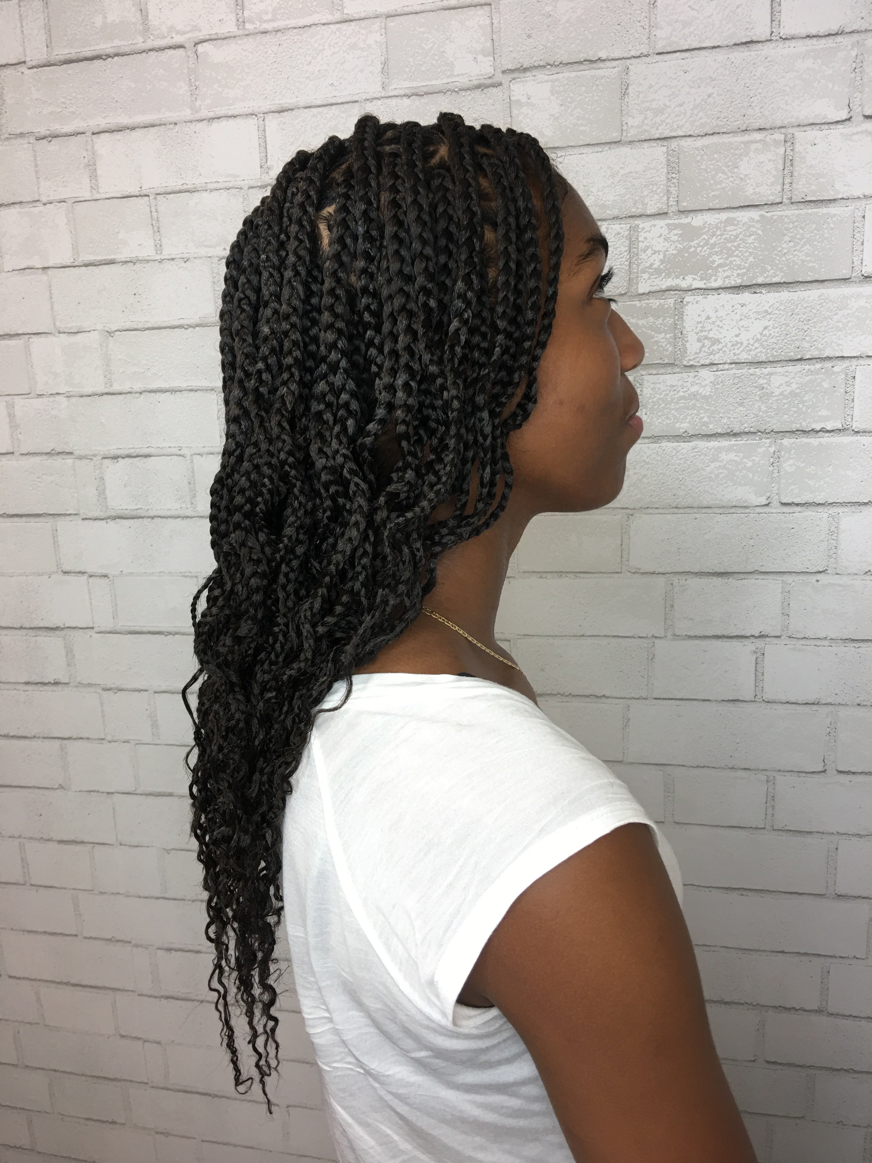 Mid-Back Length Medium Box Braids with curly ends 