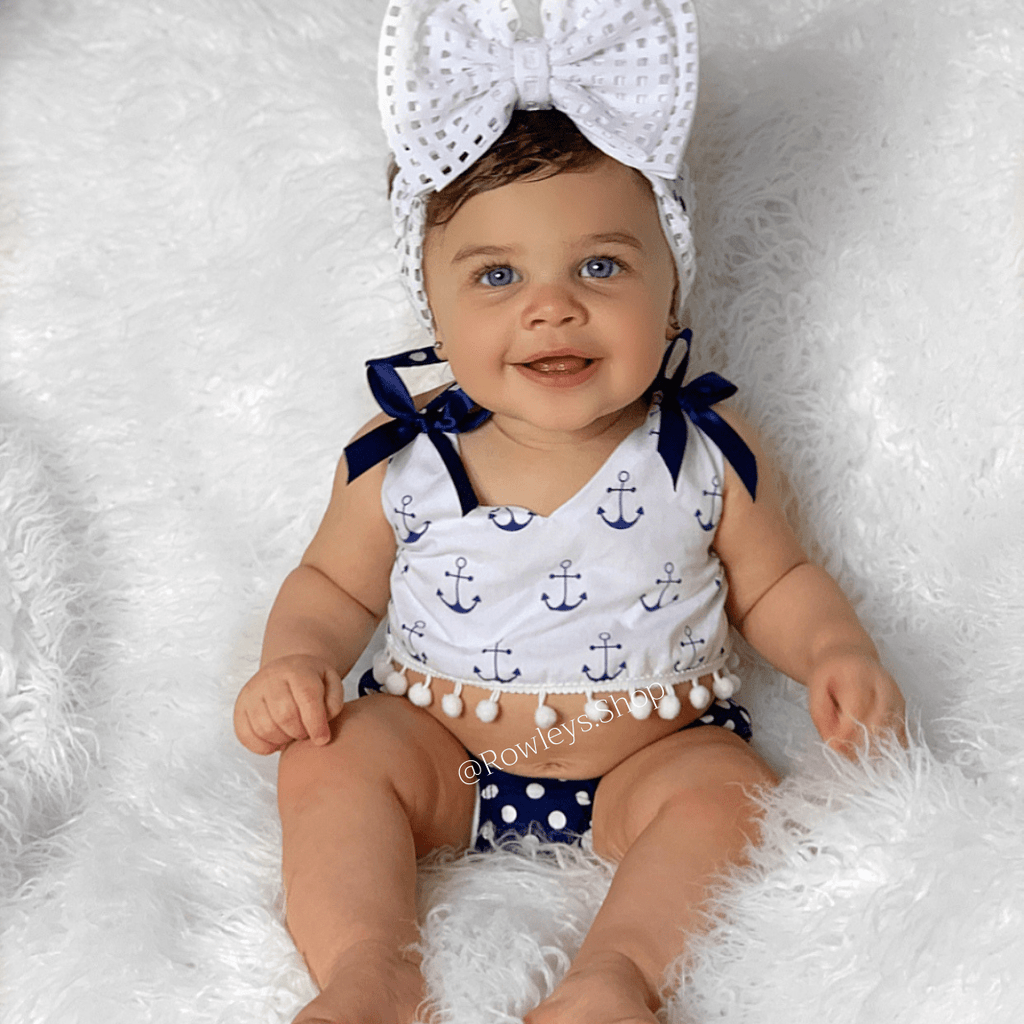 baby in sailor outfit