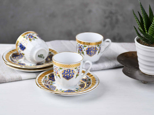 https://cdn.shopify.com/s/files/1/2230/0863/products/turkish-coffee-cup-sedef-traditional-blue-gold-set-of-6-840803_530x.jpg?v=1611854982