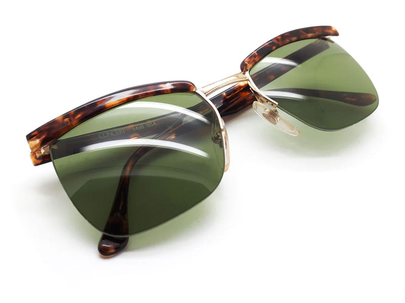 Tortoiseshell frames with deep greep lenses