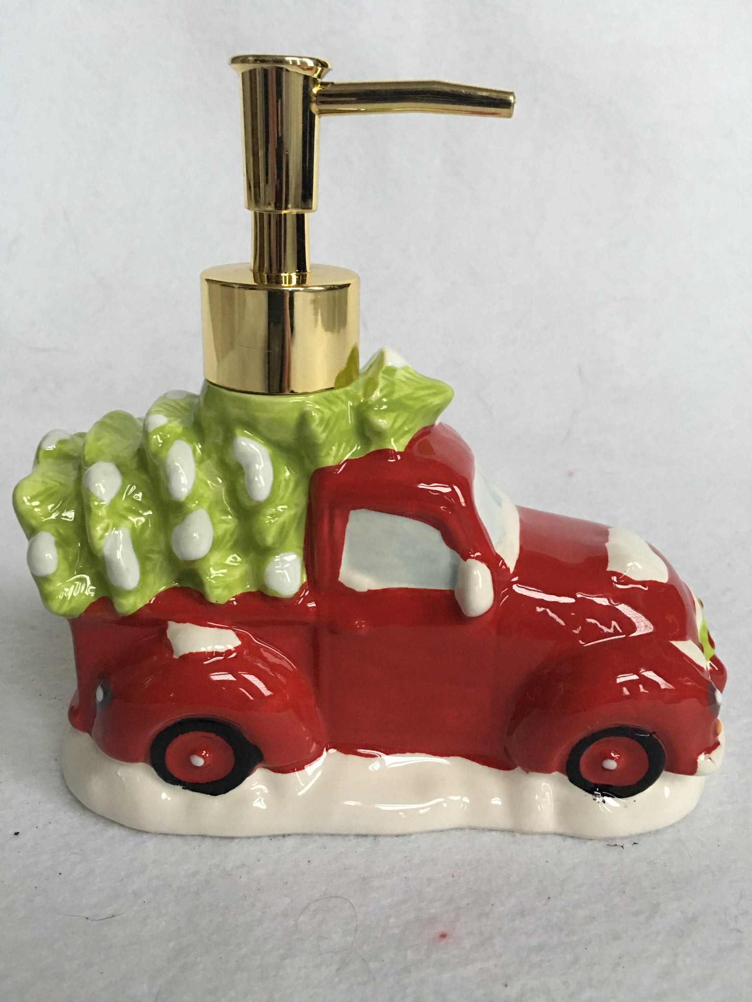 red soap dispenser