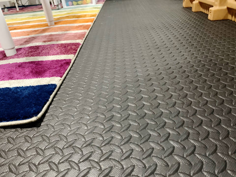 Fitness mat for child’s basement 