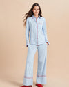 Pajama party ready. Our PJs are cut from our super soft t-shirt fabric for the ultimate in comfort and style when you need a little hygge. Pale blue cotton framed with contrasting red piping, our PJ set has a relaxed-fit top and elasticated drawstring wide-leg pants.