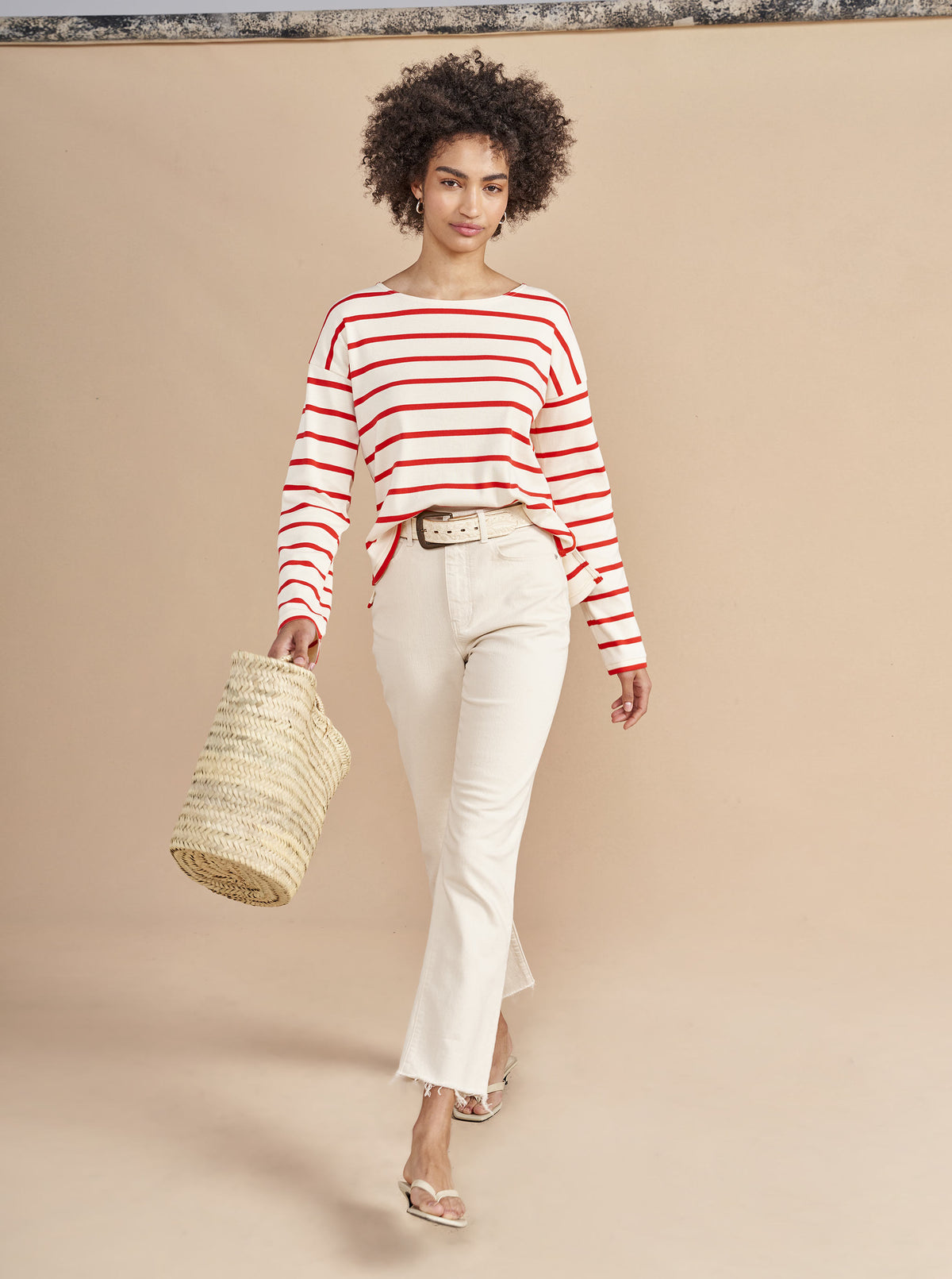 The epitome of quintessential Breton style, this long sleeve tee does it all in 100% super soft cream cotton with poppy stripes.