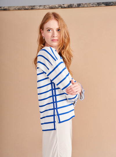The epitome of quintessential Breton style, this long sleeve tee does it all in 100% super soft ivory cotton with cobalt stripes.