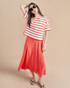 The epitome of quintessential Breton style, this tee does it all in 100% super soft cream cotton with poppy stripes.