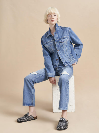 Destined to be your go-to, classic jean jacket, our version is slightly cropped so pairs perfectly with our high waisted denim, tucked in tanks or even to show off a peek of one of our oversized striped knits. 