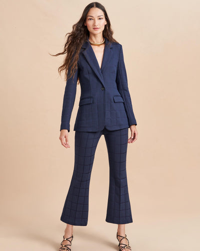 Don't take your suit to work, make it work for you. Our Frankie Blazer is made from a soft plaid, jacquard stretch fabric with a slim fit at the waist. For the full effect make sure you add the matching pant to your basket.