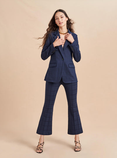 Don't take your suit to work, make it work for you. Our Frankie Blazer is made from a soft plaid, jacquard stretch fabric with a slim fit at the waist. For the full effect make sure you add the matching pant to your basket.