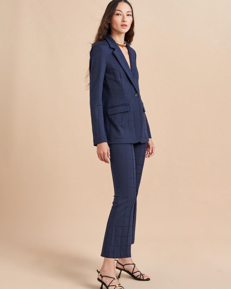 Don't take your suit to work, make it work for you. Our Frankie Blazer is made from a soft plaid, jacquard stretch fabric with a slim fit at the waist. For the full effect make sure you add the matching pant to your basket.